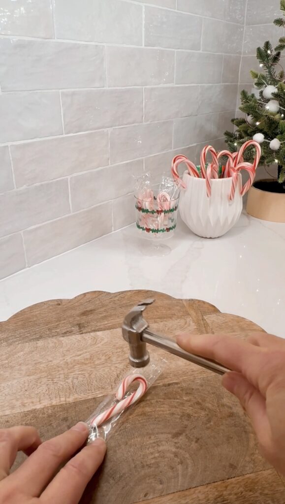 stir and gather crushing candy canes for peppermint white hot chocolate