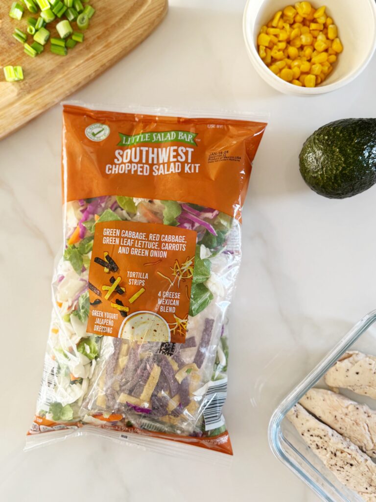 stir and gather making southwest buffalo chicken salad with an Aldi mix